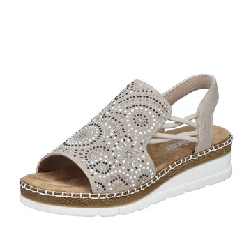 Elegáns Rieker bézs szandál strasszos felsőrésszel és kényelmes, fehér platform talppal nyári sétákhoz.